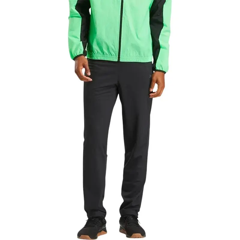 Брюки Reebok мужские 100215550 Брюки Reebok мужские 100215550 от магазина Супер Спорт